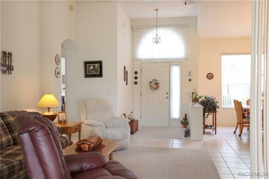 Welcome to this immaculately cared-for 3-bedroom, 2-bath home on Twisted Oaks Golf Club in Florida - for sale on GolfHomes.com, golf home, golf lot