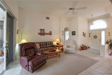 Welcome to this immaculately cared-for 3-bedroom, 2-bath home on Twisted Oaks Golf Club in Florida - for sale on GolfHomes.com, golf home, golf lot