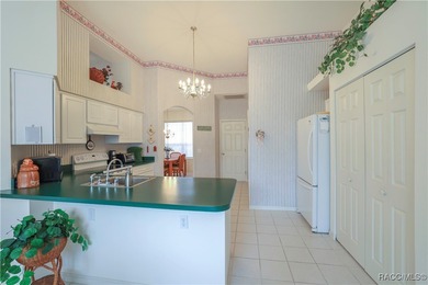 Welcome to this immaculately cared-for 3-bedroom, 2-bath home on Twisted Oaks Golf Club in Florida - for sale on GolfHomes.com, golf home, golf lot