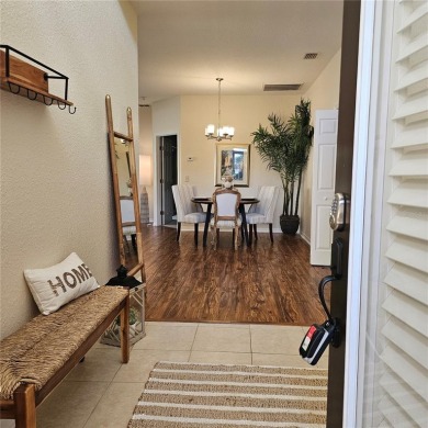 Enter this cozy home that offers the perfect space for a single on Lake Ashton Golf Club in Florida - for sale on GolfHomes.com, golf home, golf lot