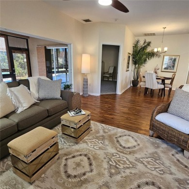 Enter this cozy home that offers the perfect space for a single on Lake Ashton Golf Club in Florida - for sale on GolfHomes.com, golf home, golf lot
