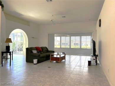 Welcome to this Osprey model home with a fabulous LAKE VIEW on Herons Glen Golf and Country Club in Florida - for sale on GolfHomes.com, golf home, golf lot