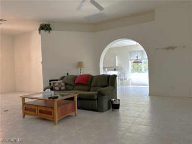 Welcome to this Osprey model home with a fabulous LAKE VIEW on Herons Glen Golf and Country Club in Florida - for sale on GolfHomes.com, golf home, golf lot