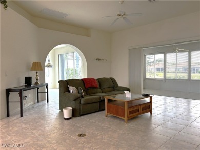 Welcome to this Osprey model home with a fabulous LAKE VIEW on Herons Glen Golf and Country Club in Florida - for sale on GolfHomes.com, golf home, golf lot