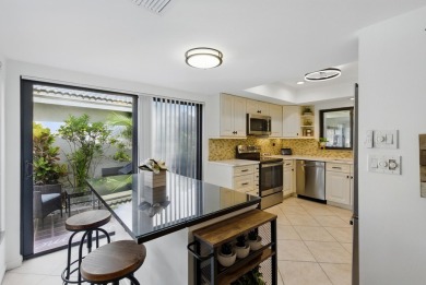 A rare find! 4 bedroom 2.5 bathroom multi-generational living on Indian Spring Golf and Country Club in Florida - for sale on GolfHomes.com, golf home, golf lot