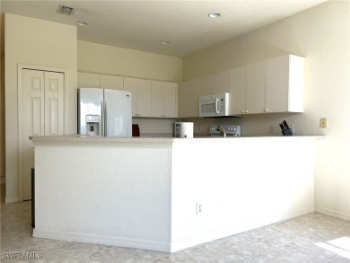 Welcome to this Osprey model home with a fabulous LAKE VIEW on Herons Glen Golf and Country Club in Florida - for sale on GolfHomes.com, golf home, golf lot