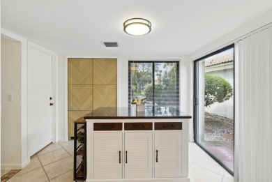 A rare find! 4 bedroom 2.5 bathroom multi-generational living on Indian Spring Golf and Country Club in Florida - for sale on GolfHomes.com, golf home, golf lot