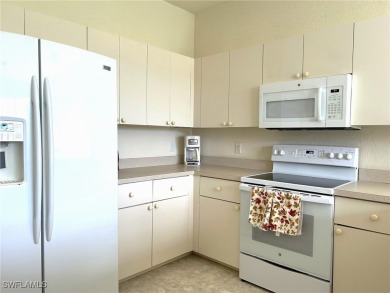 Welcome to this Osprey model home with a fabulous LAKE VIEW on Herons Glen Golf and Country Club in Florida - for sale on GolfHomes.com, golf home, golf lot