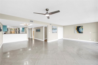 One or more photo(s) has been virtually staged. Coastal Charm - on Pasadena Yacht and Country Club in Florida - for sale on GolfHomes.com, golf home, golf lot