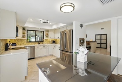 A rare find! 4 bedroom 2.5 bathroom multi-generational living on Indian Spring Golf and Country Club in Florida - for sale on GolfHomes.com, golf home, golf lot