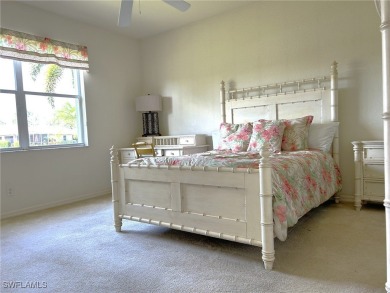 Welcome to this Osprey model home with a fabulous LAKE VIEW on Herons Glen Golf and Country Club in Florida - for sale on GolfHomes.com, golf home, golf lot