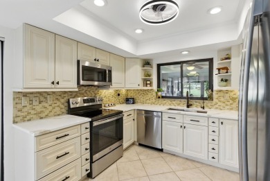 A rare find! 4 bedroom 2.5 bathroom multi-generational living on Indian Spring Golf and Country Club in Florida - for sale on GolfHomes.com, golf home, golf lot
