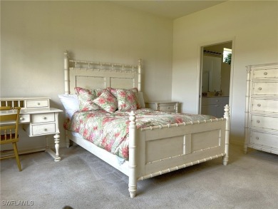 Welcome to this Osprey model home with a fabulous LAKE VIEW on Herons Glen Golf and Country Club in Florida - for sale on GolfHomes.com, golf home, golf lot