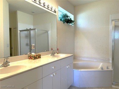 Welcome to this Osprey model home with a fabulous LAKE VIEW on Herons Glen Golf and Country Club in Florida - for sale on GolfHomes.com, golf home, golf lot
