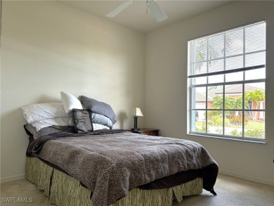 Welcome to this Osprey model home with a fabulous LAKE VIEW on Herons Glen Golf and Country Club in Florida - for sale on GolfHomes.com, golf home, golf lot