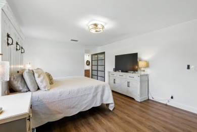 A rare find! 4 bedroom 2.5 bathroom multi-generational living on Indian Spring Golf and Country Club in Florida - for sale on GolfHomes.com, golf home, golf lot