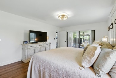 A rare find! 4 bedroom 2.5 bathroom multi-generational living on Indian Spring Golf and Country Club in Florida - for sale on GolfHomes.com, golf home, golf lot