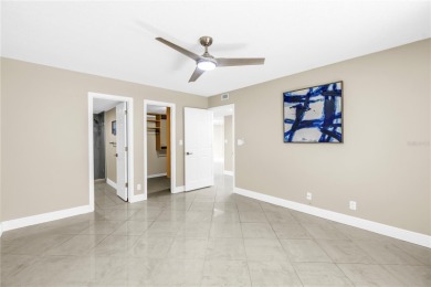 One or more photo(s) has been virtually staged. Coastal Charm - on Pasadena Yacht and Country Club in Florida - for sale on GolfHomes.com, golf home, golf lot