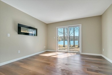 Unbeatable location nestled directly between the tranquil shores on Paupack Hills Golf and Country Club in Pennsylvania - for sale on GolfHomes.com, golf home, golf lot