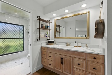 A rare find! 4 bedroom 2.5 bathroom multi-generational living on Indian Spring Golf and Country Club in Florida - for sale on GolfHomes.com, golf home, golf lot