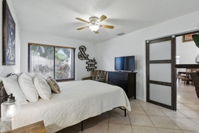 A rare find! 4 bedroom 2.5 bathroom multi-generational living on Indian Spring Golf and Country Club in Florida - for sale on GolfHomes.com, golf home, golf lot