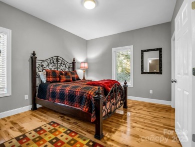 180-degree year-round panoramic mountain views from this on Rumbling Bald Resort on Lake Lure in North Carolina - for sale on GolfHomes.com, golf home, golf lot