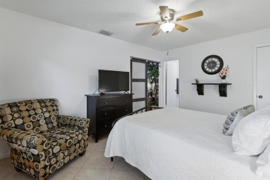 A rare find! 4 bedroom 2.5 bathroom multi-generational living on Indian Spring Golf and Country Club in Florida - for sale on GolfHomes.com, golf home, golf lot