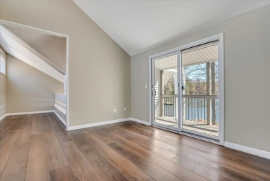 Unbeatable location nestled directly between the tranquil shores on Paupack Hills Golf and Country Club in Pennsylvania - for sale on GolfHomes.com, golf home, golf lot