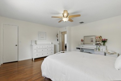 A rare find! 4 bedroom 2.5 bathroom multi-generational living on Indian Spring Golf and Country Club in Florida - for sale on GolfHomes.com, golf home, golf lot