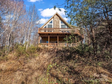 180-degree year-round panoramic mountain views from this on Rumbling Bald Resort on Lake Lure in North Carolina - for sale on GolfHomes.com, golf home, golf lot