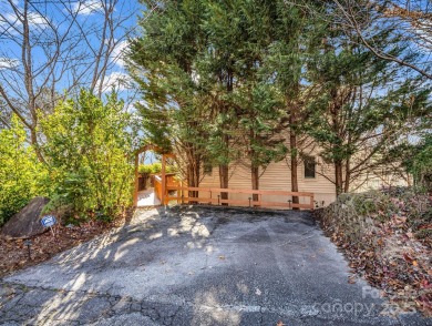 180-degree year-round panoramic mountain views from this on Rumbling Bald Resort on Lake Lure in North Carolina - for sale on GolfHomes.com, golf home, golf lot
