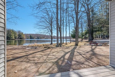 Unbeatable location nestled directly between the tranquil shores on Paupack Hills Golf and Country Club in Pennsylvania - for sale on GolfHomes.com, golf home, golf lot