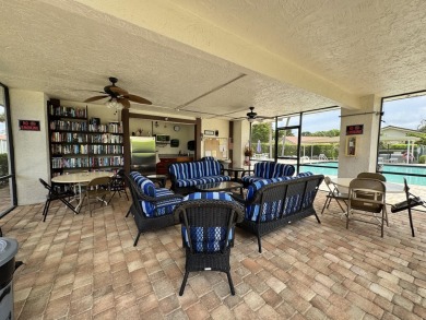 A rare find! 4 bedroom 2.5 bathroom multi-generational living on Indian Spring Golf and Country Club in Florida - for sale on GolfHomes.com, golf home, golf lot