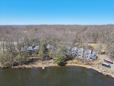Unbeatable location nestled directly between the tranquil shores on Paupack Hills Golf and Country Club in Pennsylvania - for sale on GolfHomes.com, golf home, golf lot