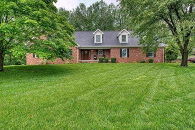 Welcome to this beautifully maintained 5-bedroom, 3.5-bathroom on Henderson Country Club in Kentucky - for sale on GolfHomes.com, golf home, golf lot