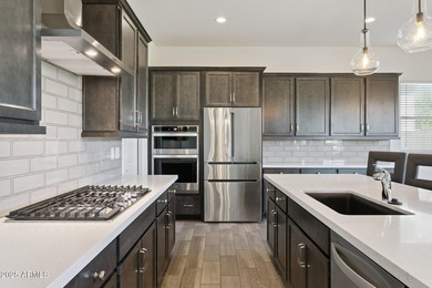 Begin your days in the guard-gated, 55+ Sterling Grove Golf & on Sterling Grove Golf & Country Club in Arizona - for sale on GolfHomes.com, golf home, golf lot