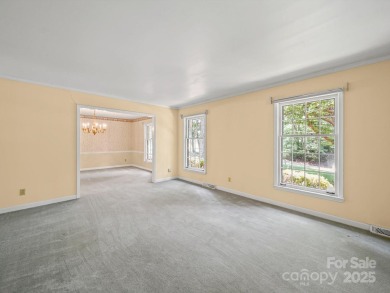 Welcome to this 1970s ranch-style home located in the desirable on Pine Island Country Club in North Carolina - for sale on GolfHomes.com, golf home, golf lot