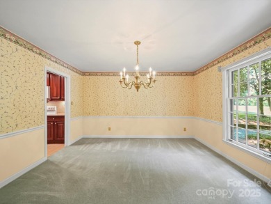 Welcome to this 1970s ranch-style home located in the desirable on Pine Island Country Club in North Carolina - for sale on GolfHomes.com, golf home, golf lot