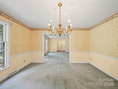 Welcome to this 1970s ranch-style home located in the desirable on Pine Island Country Club in North Carolina - for sale on GolfHomes.com, golf home, golf lot