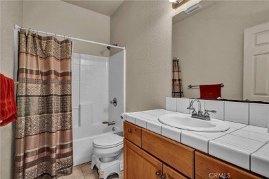 Situated on an impressive corner lot, this expansive on Hidden Valley Lake Golf and Country Club in California - for sale on GolfHomes.com, golf home, golf lot