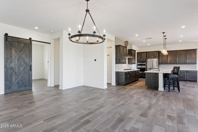 Begin your days in the guard-gated, 55+ Sterling Grove Golf & on Sterling Grove Golf & Country Club in Arizona - for sale on GolfHomes.com, golf home, golf lot