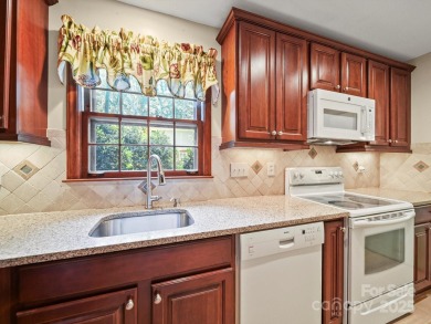 Welcome to this 1970s ranch-style home located in the desirable on Pine Island Country Club in North Carolina - for sale on GolfHomes.com, golf home, golf lot