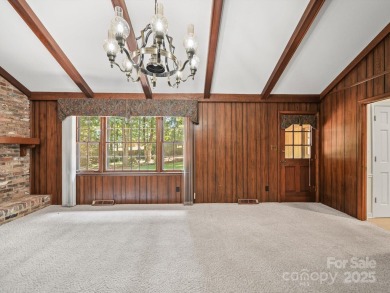 Welcome to this 1970s ranch-style home located in the desirable on Pine Island Country Club in North Carolina - for sale on GolfHomes.com, golf home, golf lot