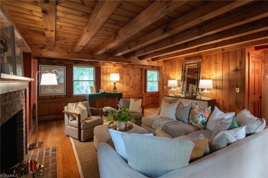 This charming, custom-built, post & beam home is quietly nestled on Sedgefield Golf Course in North Carolina - for sale on GolfHomes.com, golf home, golf lot