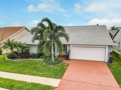 Vaulted ceilings and streaming natural light welcome you into on The Golf Club of Jupiter in Florida - for sale on GolfHomes.com, golf home, golf lot