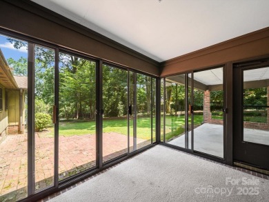 Welcome to this 1970s ranch-style home located in the desirable on Pine Island Country Club in North Carolina - for sale on GolfHomes.com, golf home, golf lot