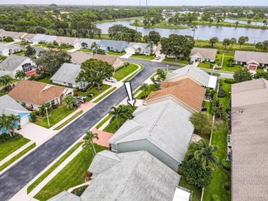 Vaulted ceilings and streaming natural light welcome you into on The Golf Club of Jupiter in Florida - for sale on GolfHomes.com, golf home, golf lot