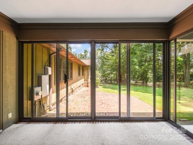 Welcome to this 1970s ranch-style home located in the desirable on Pine Island Country Club in North Carolina - for sale on GolfHomes.com, golf home, golf lot