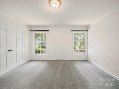 Welcome to this 1970s ranch-style home located in the desirable on Pine Island Country Club in North Carolina - for sale on GolfHomes.com, golf home, golf lot