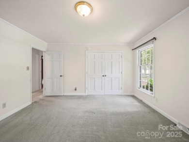 Welcome to this 1970s ranch-style home located in the desirable on Pine Island Country Club in North Carolina - for sale on GolfHomes.com, golf home, golf lot